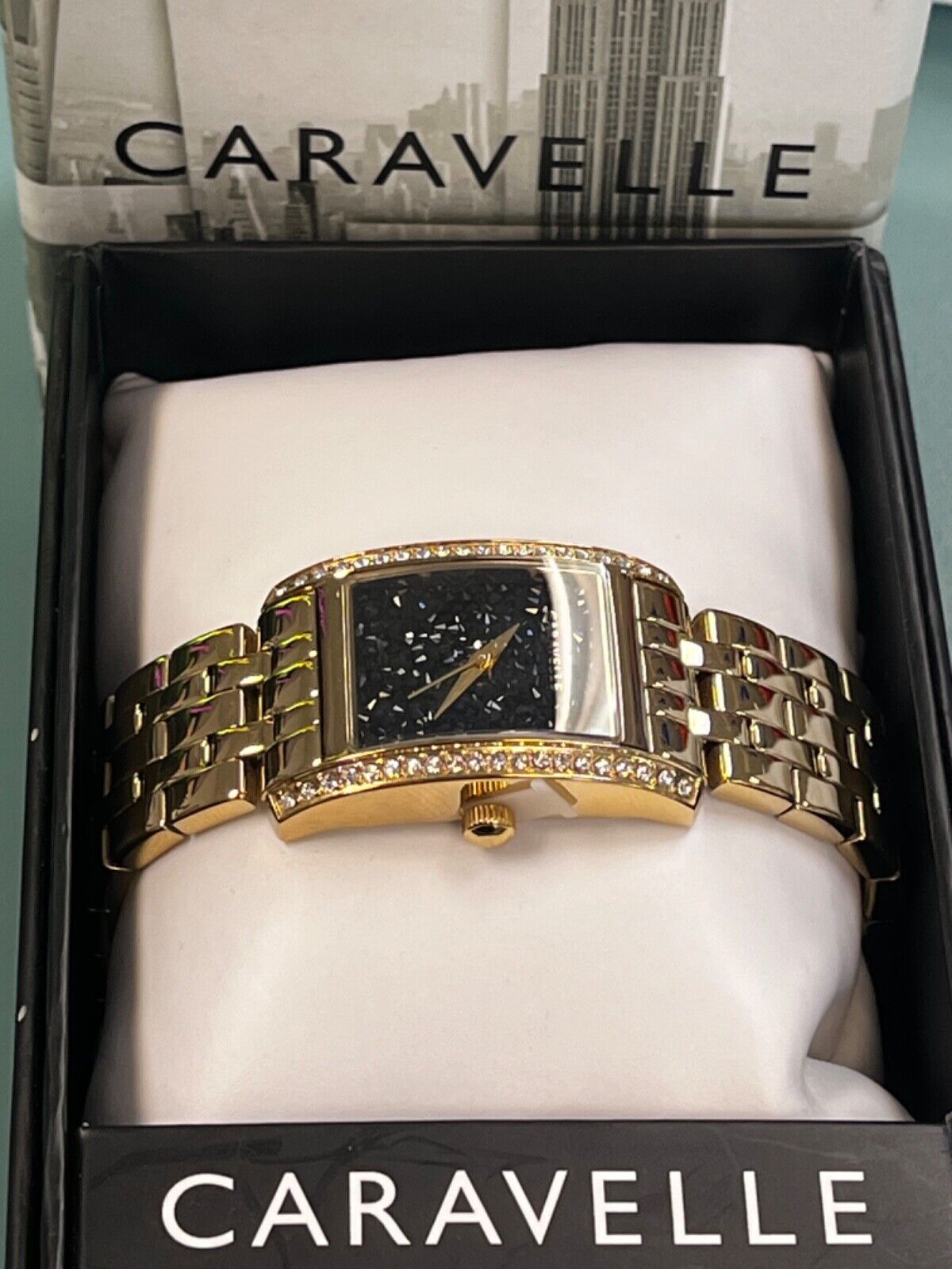 Caravell ladies watch new in box gold band with black crystals